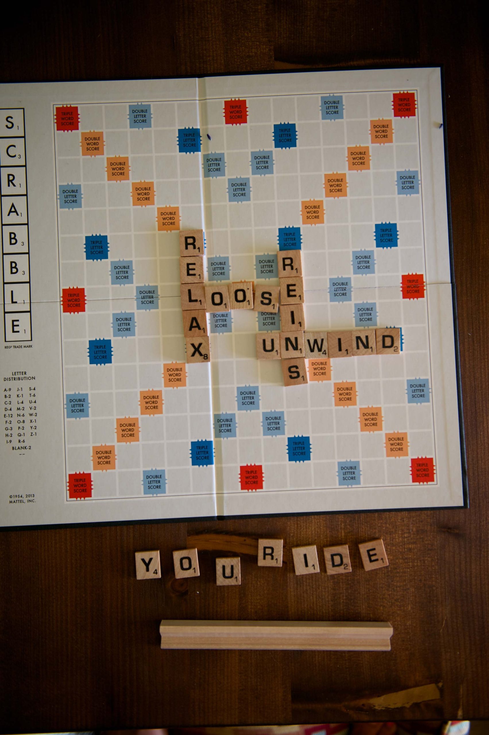 A game of scrabble on the table inside the Cabin at Loose Reins