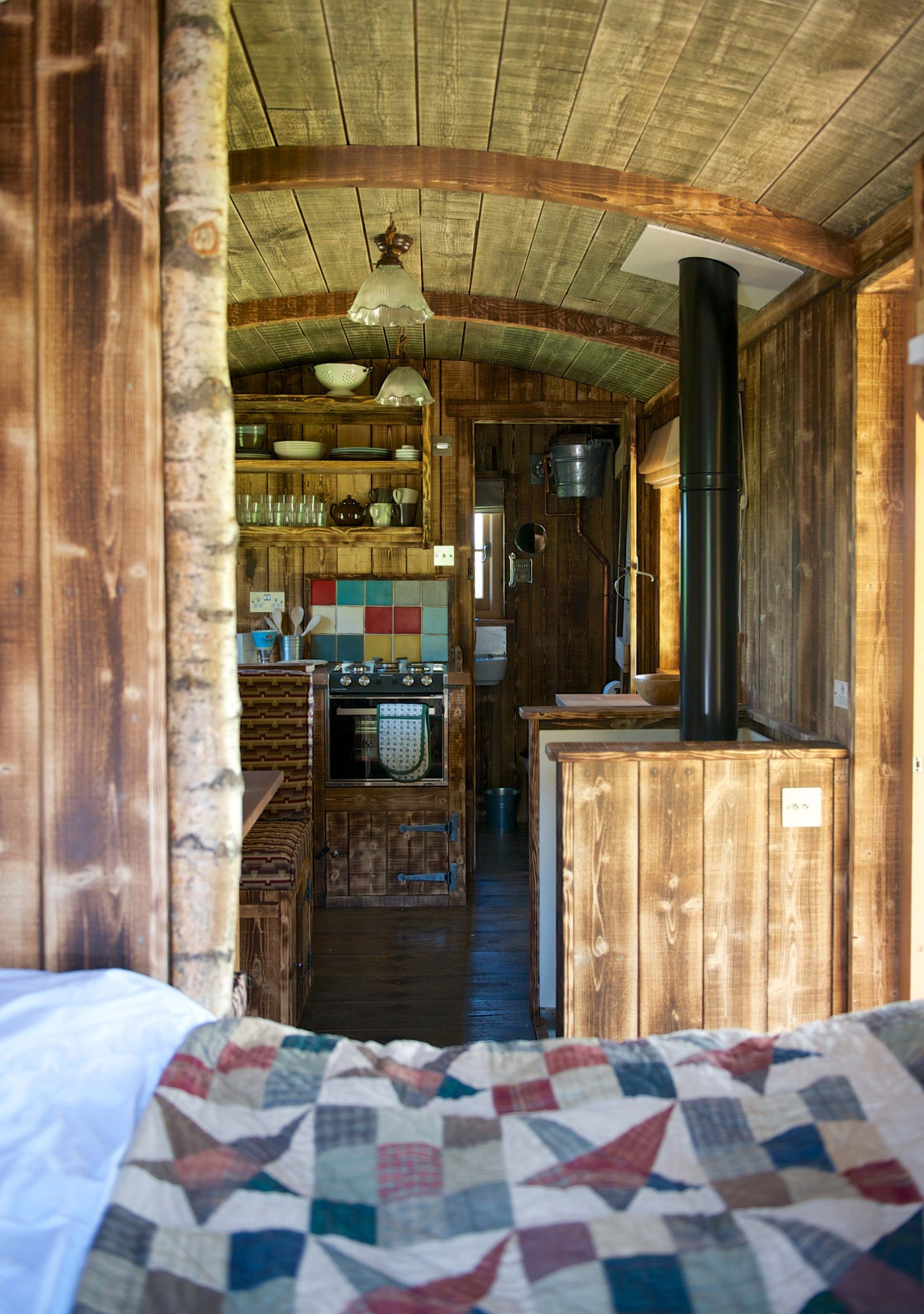The kitchen inside one of the Cabins at Loose Reins as seen from the bedroom area