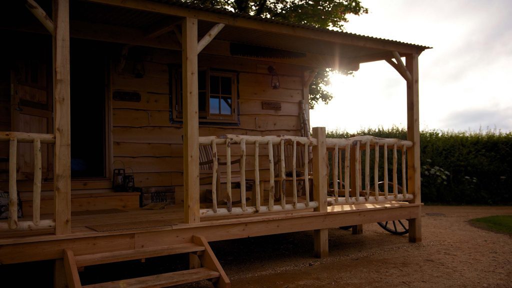 A sunset over one of the cabins at Loose Reins