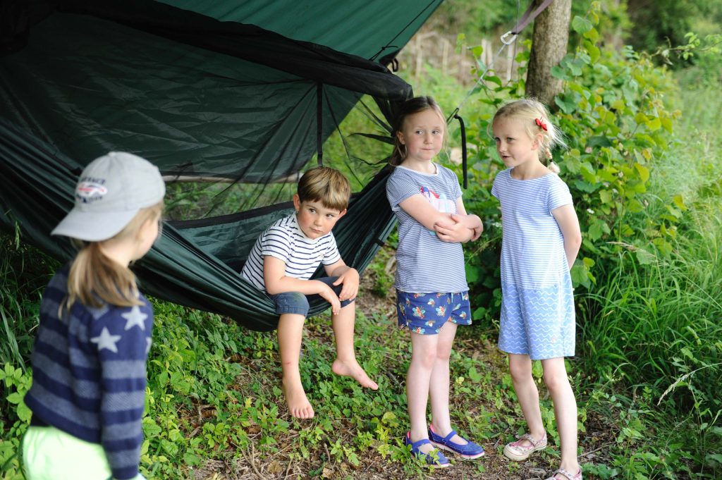 Children gathered at the Hammock to discuss an adventure at Loose Reins