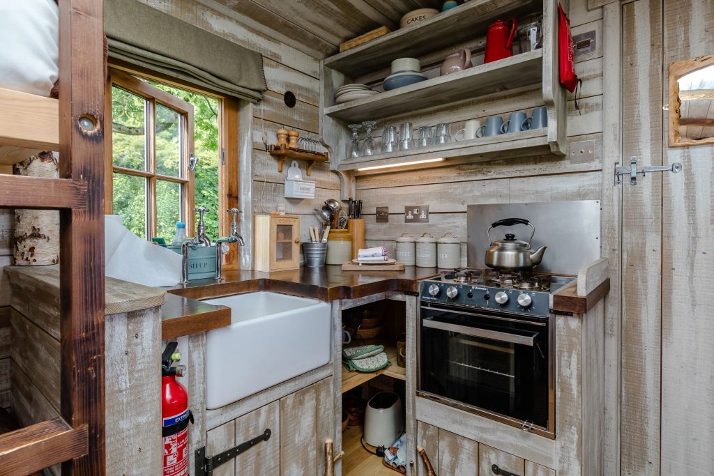 Kitchen inside Trappers Glamping Cabin at Loose Reins in Dorset