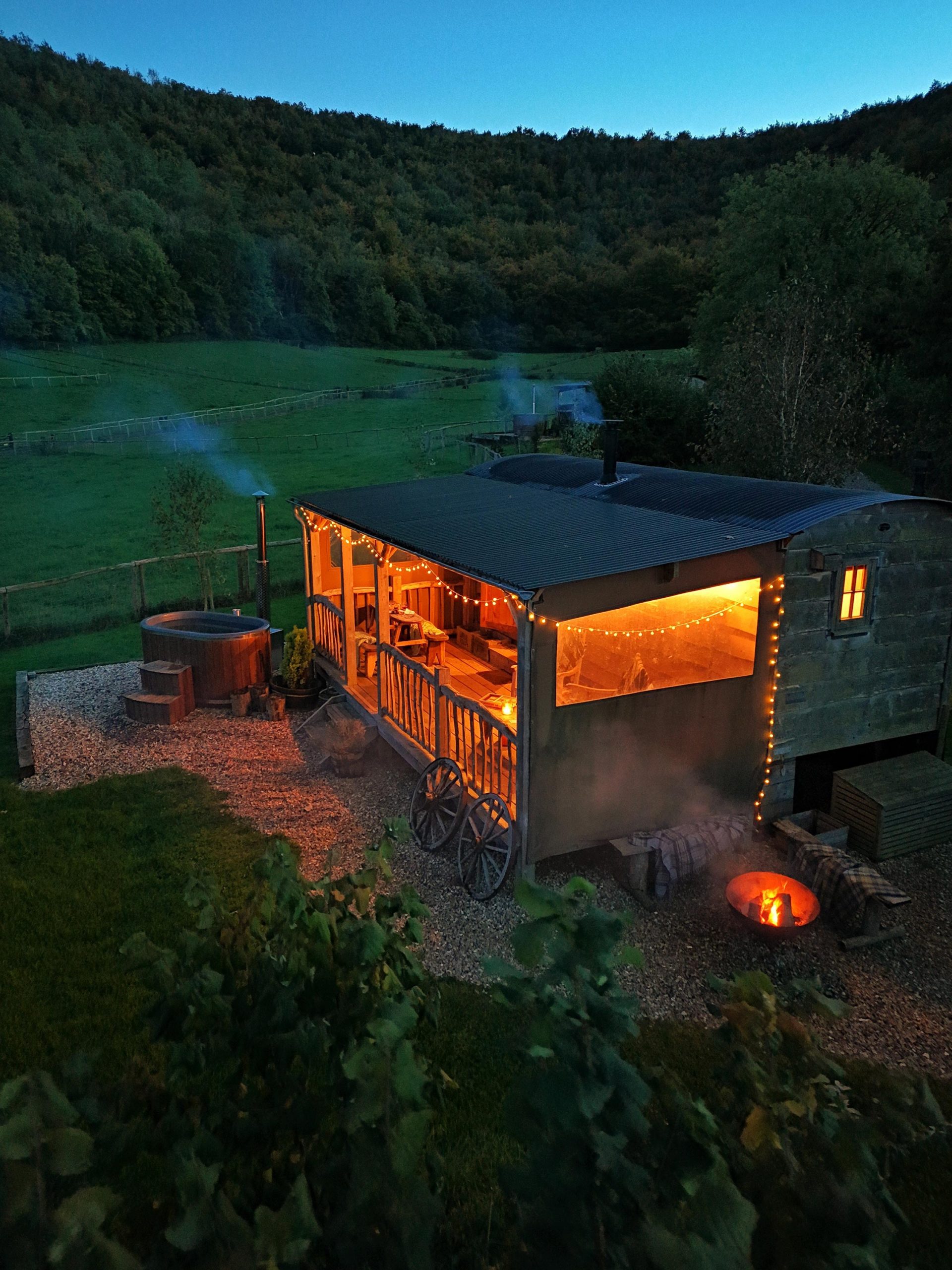 Aerial exterior of Gold Panners Cabin with Dorset Hills in background