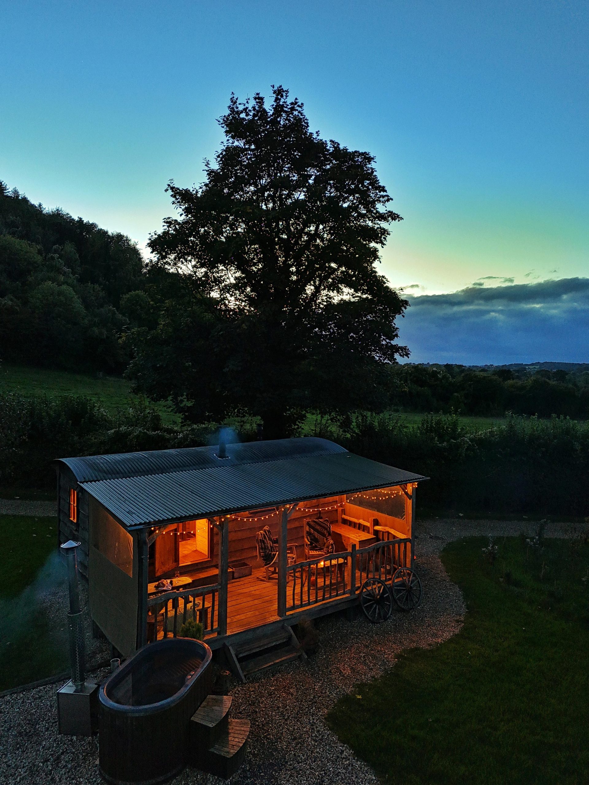 Exterior of Gold Panners Cabin lit up at dusk